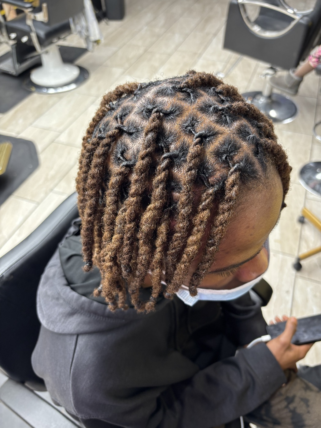 Client loc and twist style by The Most Gifted Palms